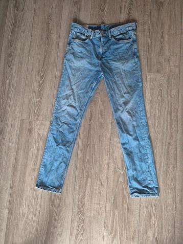 H&M Slim Fit Spijkerbroek - Maat 44 beschikbaar voor biedingen