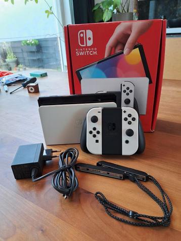 Nintendo switch oled in originele doos beschikbaar voor biedingen