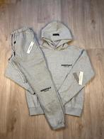 Essensials trainingspak grijs, Kleding | Dames, Ophalen of Verzenden, Nieuw, Grijs