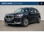BMW iX1 eDrive20 / Trekhaak / Parking Assistant / Stoelverwa, Auto's, BMW, Stof, Zwart, Nieuw, SUV of Terreinwagen