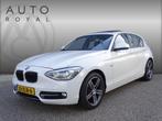 BMW 1-serie 116i Upgrade Edition AUTOMAAT | PANORAMDAK | CRU, Auto's, BMW, Gebruikt, Zwart, 4 cilinders, Wit
