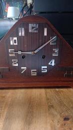 Amsterdamse School Klok, Ophalen