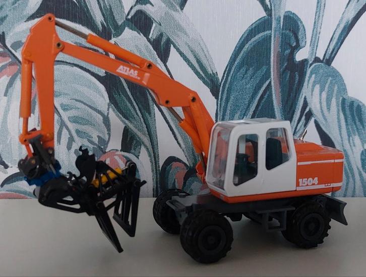 Atlas Terex 1504 en draaikantelstuk met CW snelwissel Conrad, Hobby en Vrije tijd, Modelauto's | 1:50, Zo goed als nieuw, Bus of Vrachtwagen