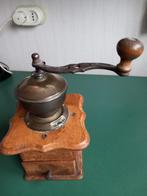 Antieke koffiemolen, Ophalen