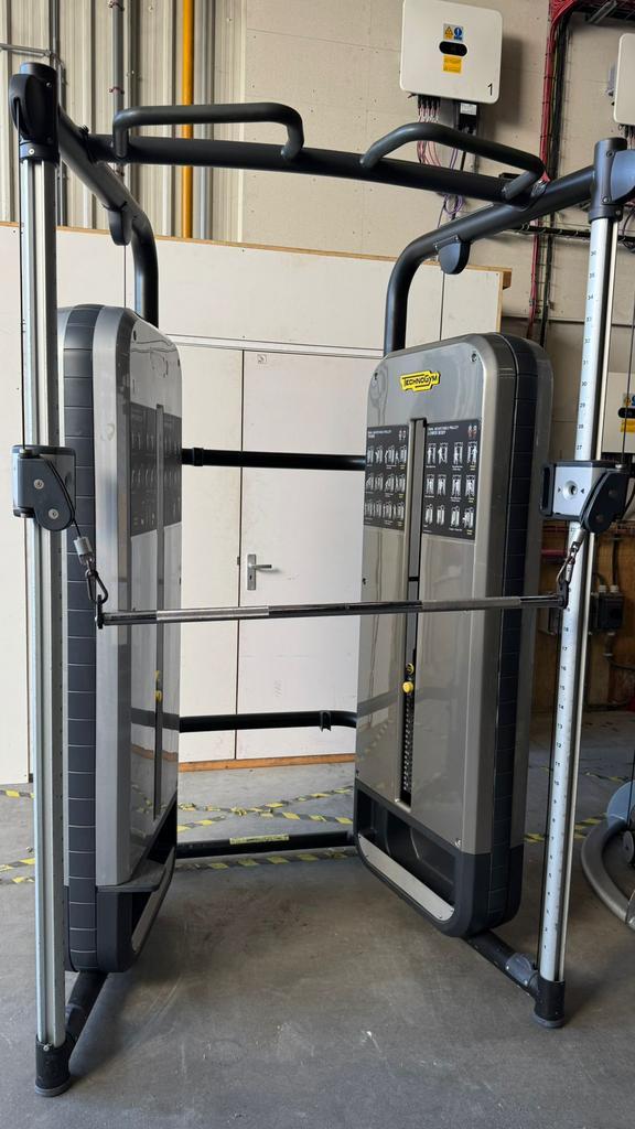 Zwarte Technogym Dual Adjustable Pulley, Sport en Fitness, Fitnessmaterialen, Gebruikt, Overige typen, Armen, Benen, Borst, Rug