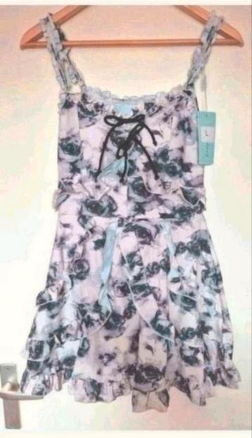 Nieuw badpak met vast broekje maat XS. Okselmaat 36 cm. beschikbaar voor biedingen