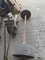 Zware as met volrubberen banden, Ophalen