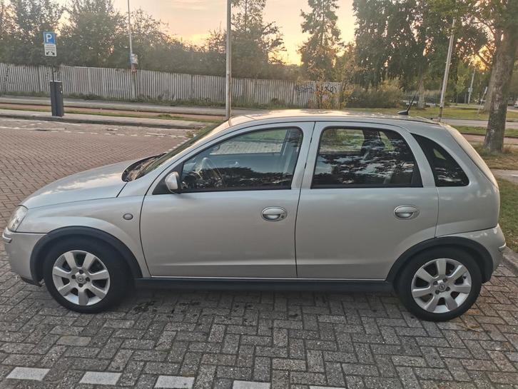 Opel Corsa 1.4 5D 2006 GRIJS NAVI/PDC/AIRCO, Auto's, Opel, Particulier, Corsa, ABS, Airconditioning, Boordcomputer, Centrale vergrendeling
