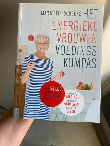 Het energieke vrouwen voedingkompas boek beschikbaar voor biedingen