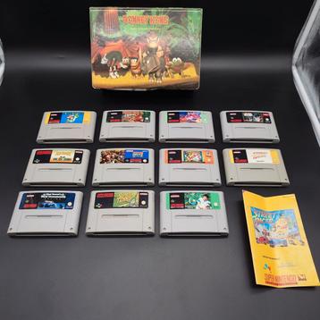 11 SNES games met bewaar doos mario donkey kong country etc beschikbaar voor biedingen