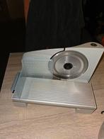 snijmachine, Ophalen