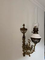 Olie wandlamp, Ophalen