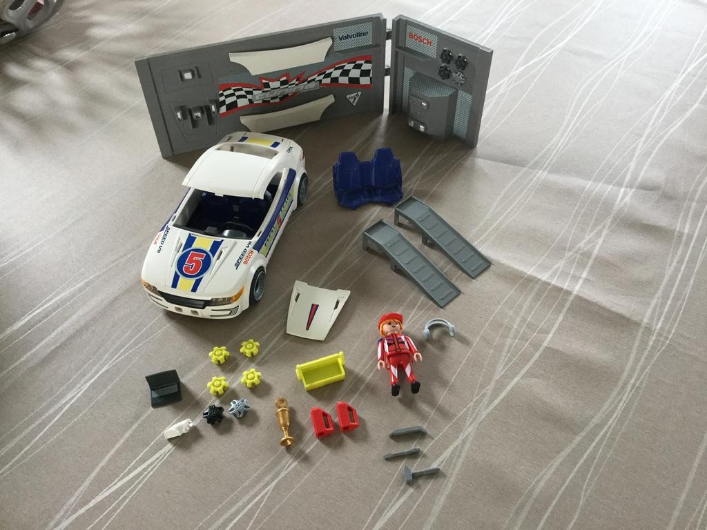 Playmobil auto bij garage., Ophalen of Verzenden, Zo goed als nieuw