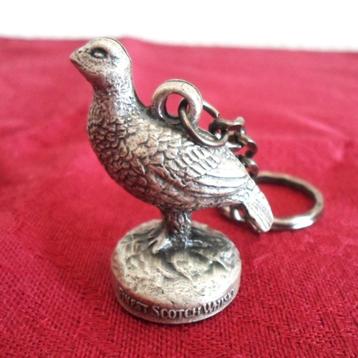 The Famous Grouse sleutelhanger. Finest Scotch Whisky beschikbaar voor biedingen