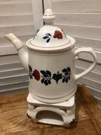 Theelicht (vierkant) en theepot van Boerenbont, Ophalen