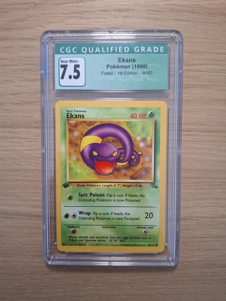 Ekans 46 1st Edition CGC 7.5 INKED Fossil, Hobby en Vrije tijd, Verzamelkaartspellen | Pokémon, Nieuw, Losse kaart, Ophalen of Verzenden