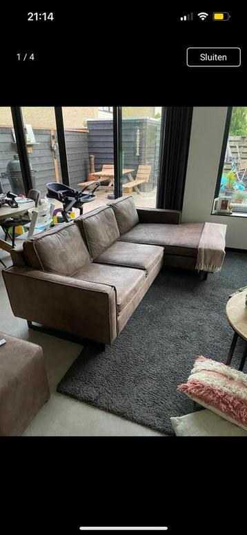 Bijna nieuwe leren bank te koop beschikbaar voor biedingen