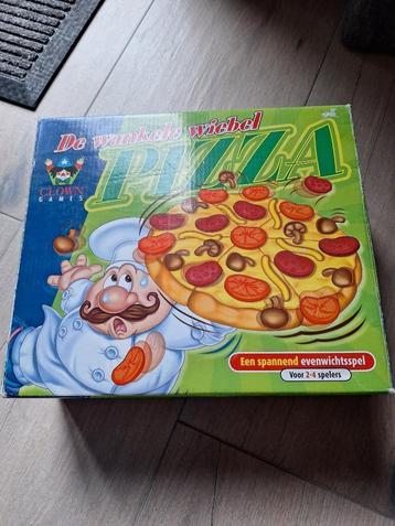 Spel: De wankele wiebel pizza beschikbaar voor biedingen