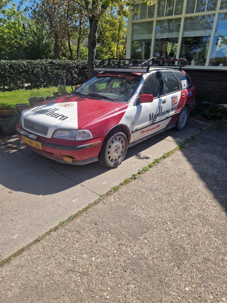 Volvo V40 2.0 T 1998 Rood, Auto's, Volvo, V40, Benzine, Stationwagon, Handgeschakeld, Origineel Nederlands, Rood, Zwart, Stof