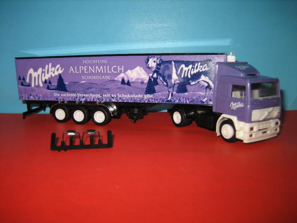 Milka-Alpenmilch   VOLVO  F-12 met oplegger Herpa/Albedo, Ophalen of Verzenden, Nieuw, Bus of Vrachtwagen, Herpa