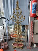 gietijzeren kapstok, Ophalen