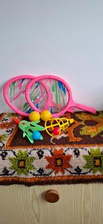 Buitenspeelgoed: rackets en 2 vangspellen, Ophalen