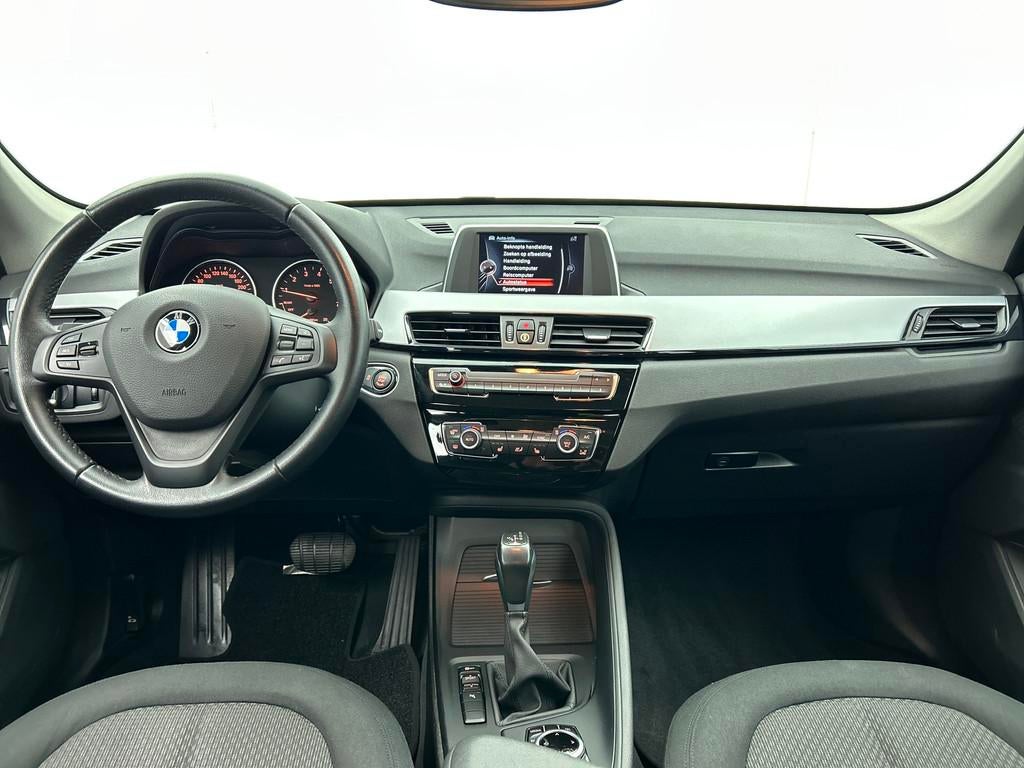BMW X1 SDrive18i Centennial High Executive (NAVIGATIE, PARKE, Auto's, Gebruikt, 19 km/l, 3 cilinders, 1405 kg