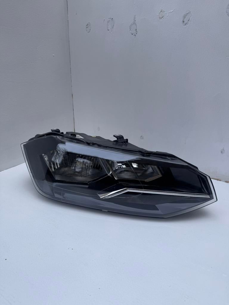 Orginele Volkswagen polo koplamp, Ophalen of Verzenden, Volkswagen