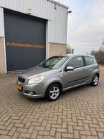Chevrolet Aveo 1.2 16V 3D 2009 Grijs, Auto's, Chevrolet, Voorwielaandrijving, Stof, Aveo, 4 cilinders
