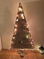 Houten kerstboom, Ophalen