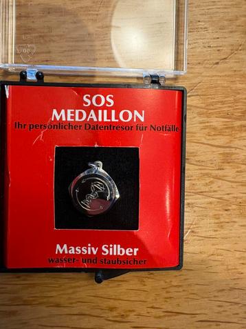 Sterling zilveren SOS hanger. Met briefje voor medische info beschikbaar voor biedingen