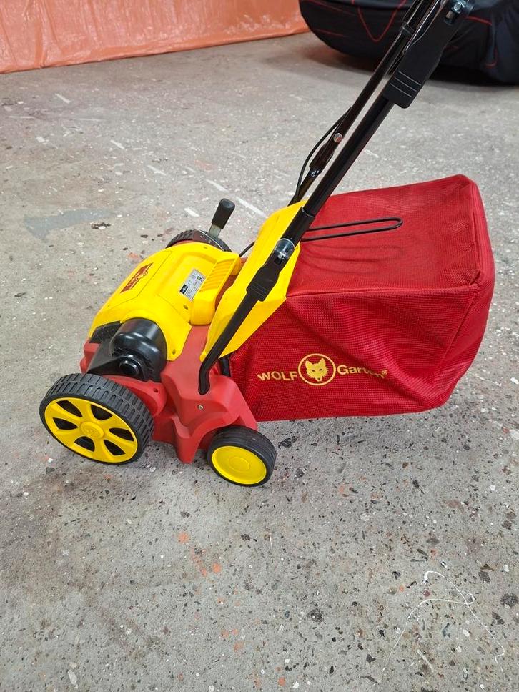Wolf verticuteermachine, Tuin en Terras, Grasmaaiers, Zo goed als nieuw, Opvangzak, Ophalen