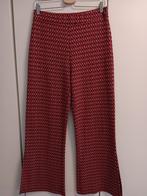 Benetton lange rode broek met print mt.L, Kleding | Dames, Ophalen, Benetton, Maat 42/44 (L), Zo goed als nieuw