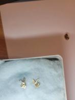 Gouden playboy oorbellen, Met edelsteen, Ophalen of Verzenden, Zo goed als nieuw, Knopjes of Stekers