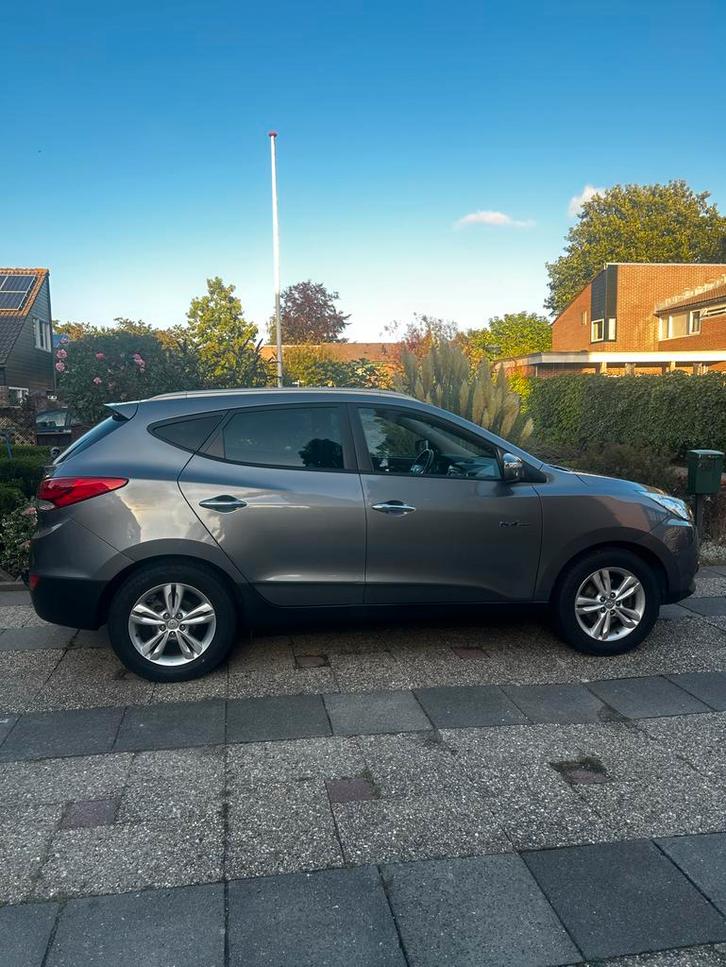 Hyundai iX35 1.6i GDI Blue 135pk 2012 Grijs, Auto's, Hyundai, Particulier, iX35, ABS, Adaptive Cruise Control, Airbags, Airconditioning