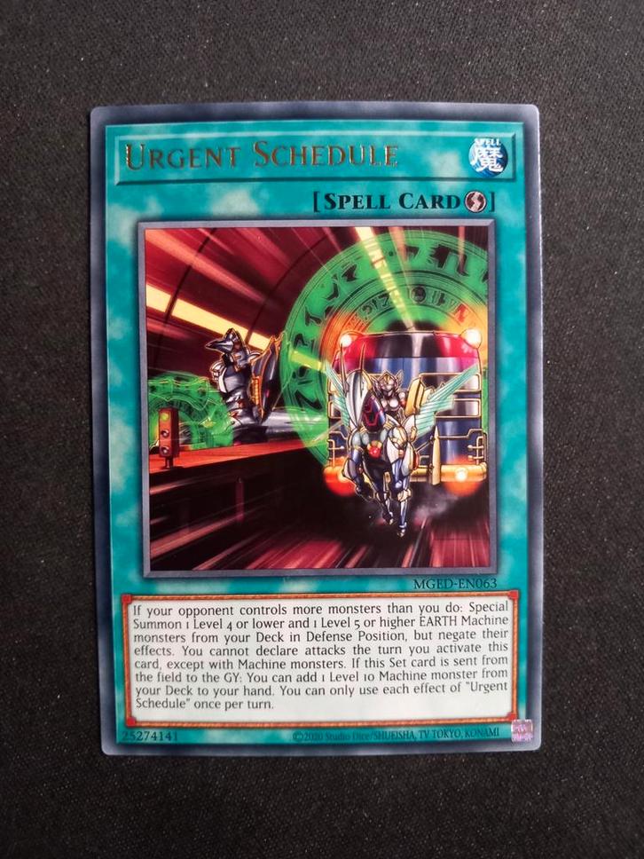 Maximum Gold: El Dorado Urgent Schedule 063 NM, Hobby en Vrije tijd, Verzamelkaartspellen | Yu-gi-Oh!, Zo goed als nieuw, Losse kaart
