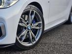 BMW 1-serie M135i xDrive |OPENDAK|H&K|STUUR/STOELVERW, Gebruikt, Zwart, Met garantie (alle), Wit