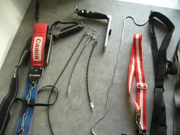 Draagriemen camera, draadontspanners ed. Canon o.a beschikbaar voor biedingen