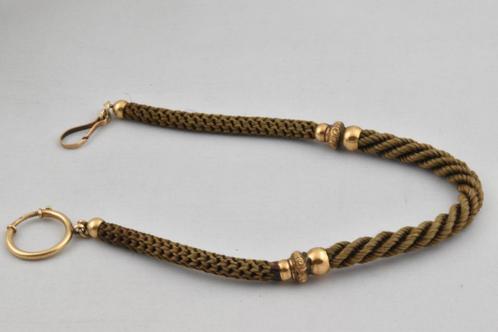 Horlogeketting van paardenhaar met gouden ornament 1909-G, Sieraden, Tassen en Uiterlijk, Antieke sieraden, Ketting, Goud, Ophalen of Verzenden