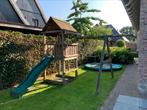 Te koop: houten speelhuis van Jungle Gym., Kinderen en Baby's, Speelgoed | Buiten | Speeltoestellen, Ophalen, Gebruikt, Glijbaan