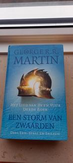 George R.R. Martin - een storm van zwaarden staal en sneeuw, Boeken, Ophalen of Verzenden, Zo goed als nieuw, George R.R. Martin