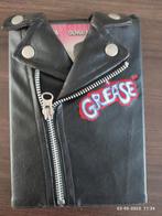 Grease dvd in leren T-Birds jasje, Alle leeftijden, Ophalen of Verzenden, Zo goed als nieuw