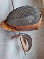 Schermmasker en degen, Ophalen