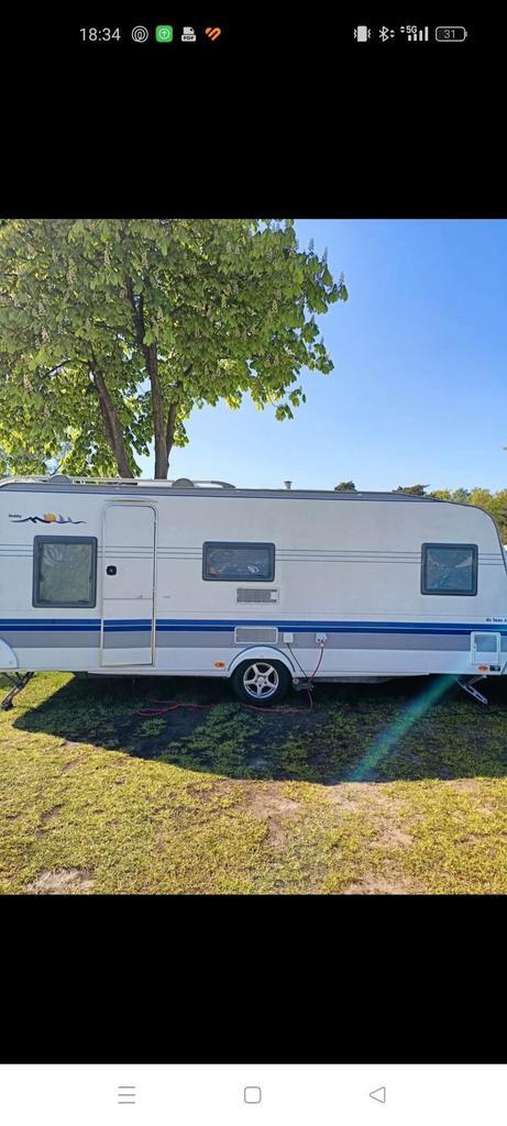 Mooie hobby easy de luxe 560., Caravans en Kamperen, Caravans, Particulier, tot en met 6, 1250 - 1500 kg, Rondzit, Hobby, Vast bed