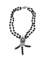 Ketting van gitten kralen op zilverdraad met zilveren sloten