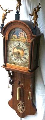 friese staartklok in eiken kast, Ophalen