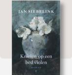 Knielend op een bed violen, Ophalen, Zo goed als nieuw