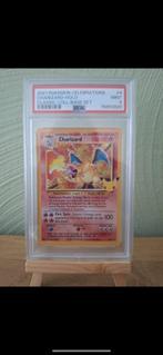 Charizard celebrations PSA 9, Hobby en Vrije tijd, Verzamelkaartspellen | Pokémon, Ophalen of Verzenden, Zo goed als nieuw, Losse kaart