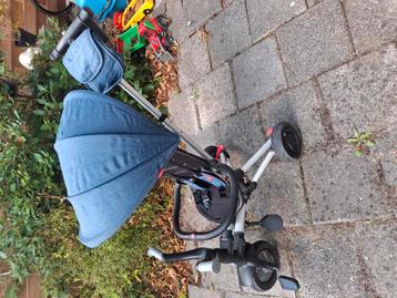 Driewieler met duwstang beschikbaar voor biedingen