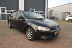 Volkswagen Jetta 1.6 TDI Highline BlueMotion (bj 2011), Auto's, Volkswagen, Voorwielaandrijving, Euro 5, 4 cilinders, Leder en Stof